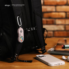 Custodia AirTag W5 RETRO Joystick - Rosa